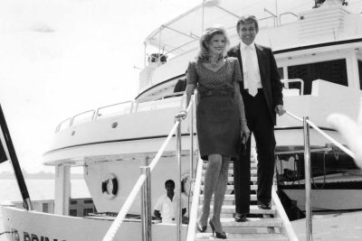 A black and white photo of Donald Trump and Ivanka Trump onboard the